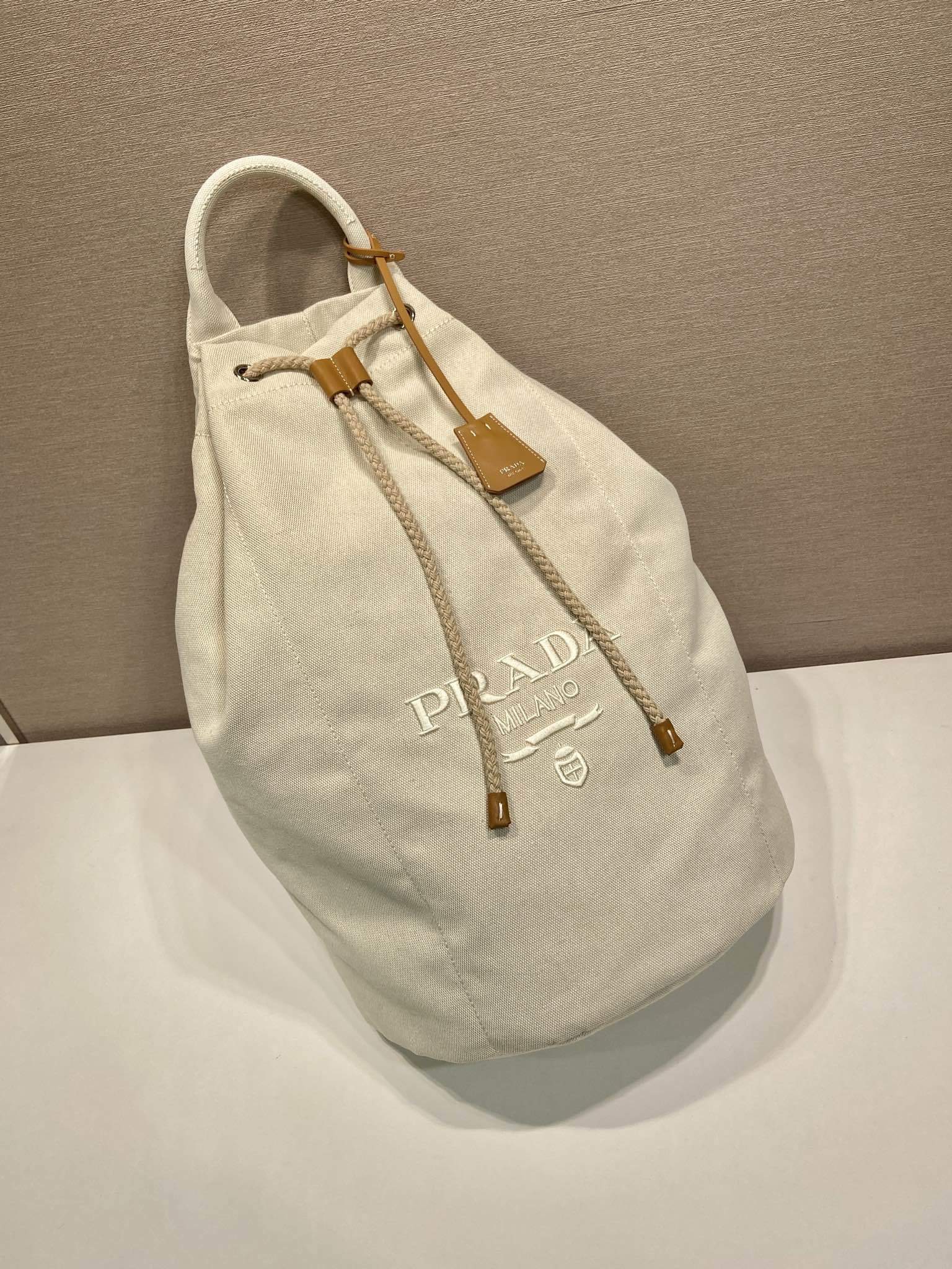 Prada linen blend drawstring duffel bag