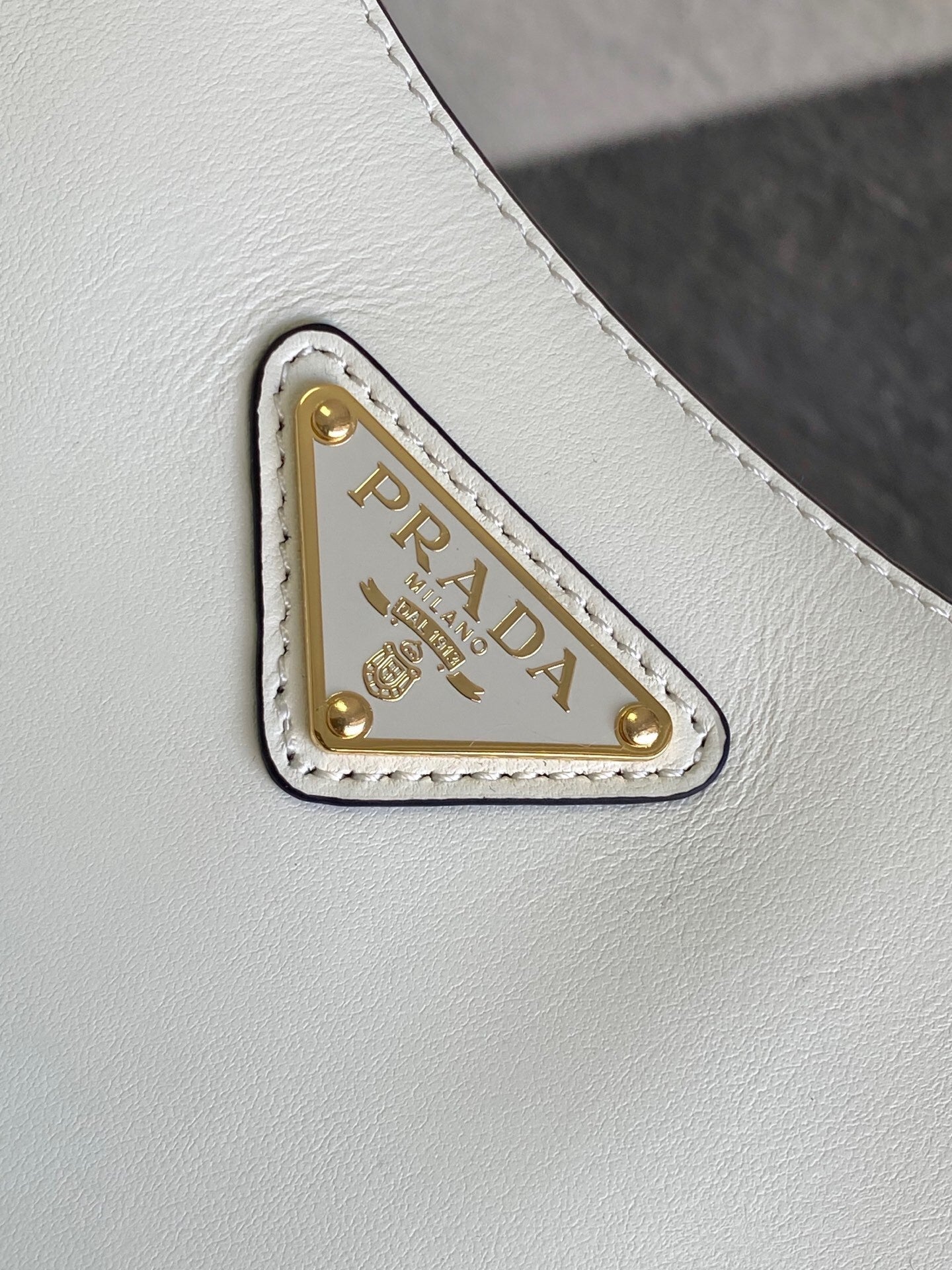 Prada Arqué small leather shoulder bag